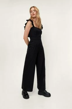 Dobby Texture Ruffle Wide Leg Jumpsuit 9 Dobby Texture Ruffle Wide Leg Jumpsuit -Nasty Gal Sales Store Sales womens black dobby texture ruffle wide leg jumpsuit 5