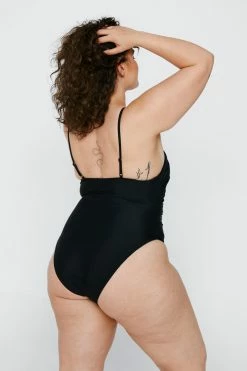Plus Size Recycled Polyester Ruched Swimsuit 11 Plus Size Recycled Polyester Ruched Swimsuit -Nasty Gal Sales Store Sales womens black plus size recycled polyester ruched swimsuit 1
