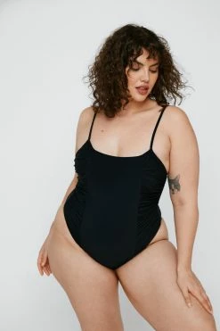 Plus Size Recycled Polyester Ruched Swimsuit 10 Plus Size Recycled Polyester Ruched Swimsuit -Nasty Gal Sales Store Sales womens black plus size recycled polyester ruched swimsuit