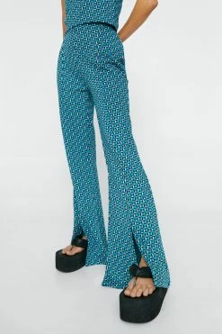 Geo Jacquard Split Hem Flared Pants 5 Geo Jacquard Split Hem Flared Pants -Nasty Gal Sales Store Sales womens blue geo jacquard split hem flared pants 1
