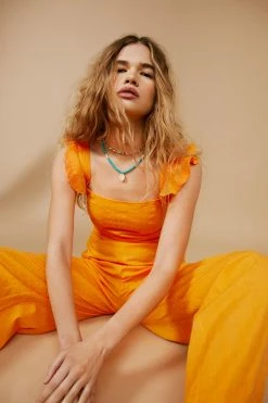 Dobby Texture Ruffle Wide Leg Jumpsuit 10 Dobby Texture Ruffle Wide Leg Jumpsuit -Nasty Gal Sales Store Sales womens orange dobby texture ruffle wide leg jumpsuit 4