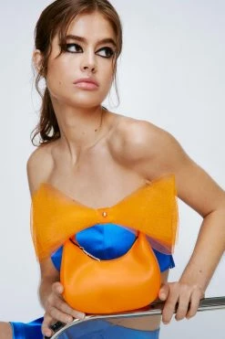 Oversized Bow Wristlet Grab Bag -Nasty Gal Sales Store Sales womens orange oversized bow wristlet grab bag 3