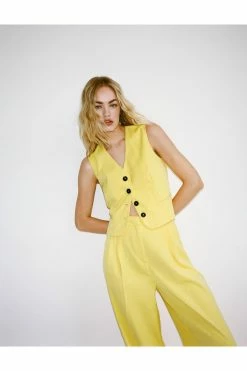 Cropped Tailored Single Breasted Vest 41 Cropped Tailored Single Breasted Vest -Nasty Gal Sales Store Sales womens yellow cropped tailored single breasted vest 1